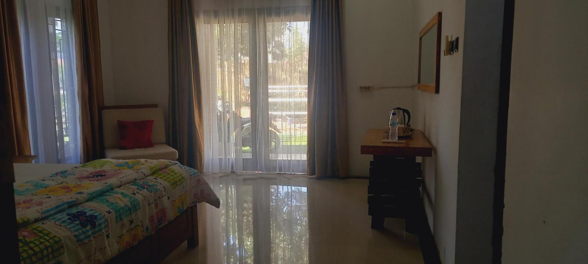 Inang Amang Homestay Labuan Bajo Værelse billede